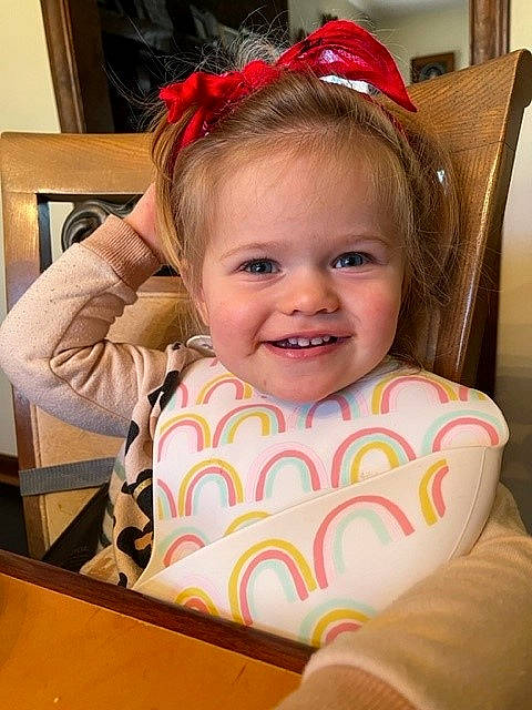 Sadie is registered to the contest to win money with this photo: baby, baby_products, baby_toddler_clothing, blond, chair, cheek, child, comfort, costume_hat, event, fun, hair, happy, headband, headpiece, iris, joy, lip, person, skin