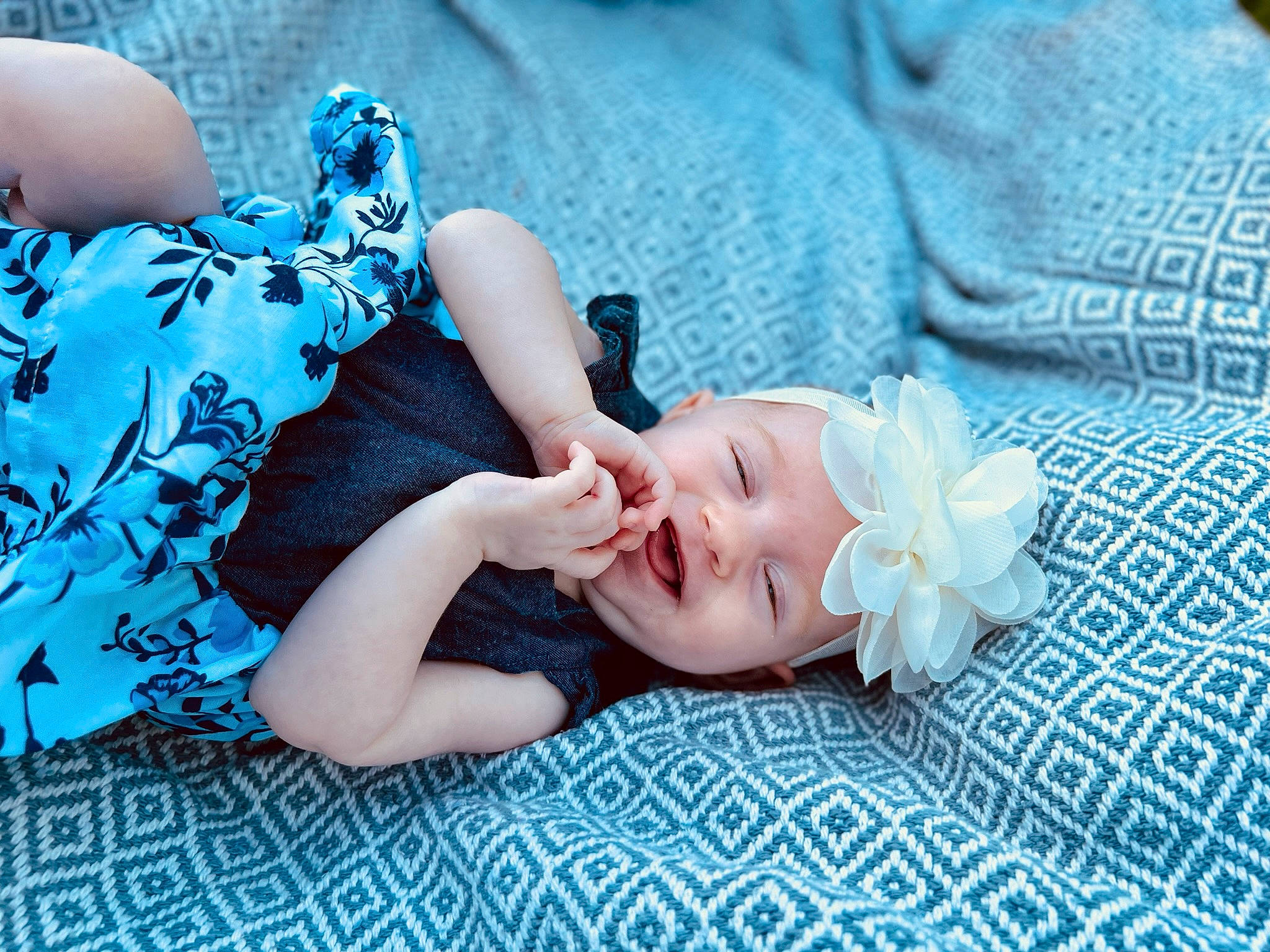 Ezmé joined the competition — help win amazing prizes! aqua, azure, baby, baby_toddler_clothing, blue, cool, doll, finger, grass, hand, happy, headgear, headwear, nail, person, pink, plant, purple, skin, textile