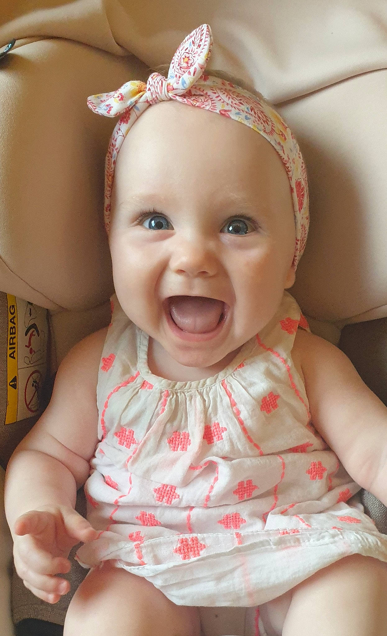 Elena participe au concours pour gagner de l'argent avec cette photo : baby, baby_laughing, baby_making_funny_faces, baby_toddler_clothing, cheek, child, chin, ear, face, facial_expression, head, headgear, iris, lip, mouth, nose, person, pink, skin, smile
