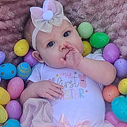 Charlie joined the competition — help win amazing prizes! baby, infant, girl, bow, headband, tutu, dress, blanket, easter_eggs, colorful, pastel_colors, cute, lying_down, thumb_sucking, portrait, soft_texture, holiday, celebration, child, indoors