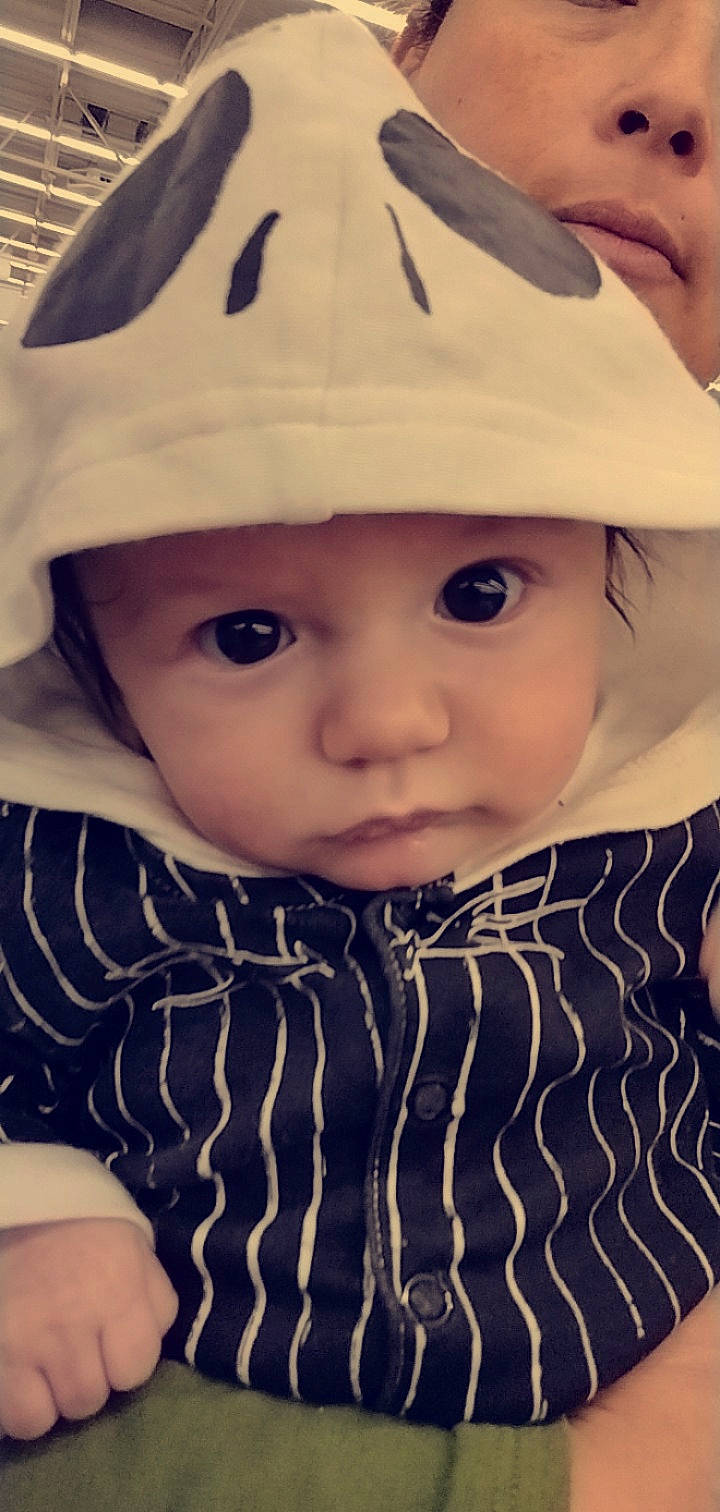 Mesiyah is registered to the contest to win money with this photo: baby, baby_toddler_clothing, bonnet, cap, cheek, child, cool, costume_hat, face, fashion_accessory, hat, headgear, headwear, outerwear, pattern, person, portrait_photography, skin, sleeve, sun_hat