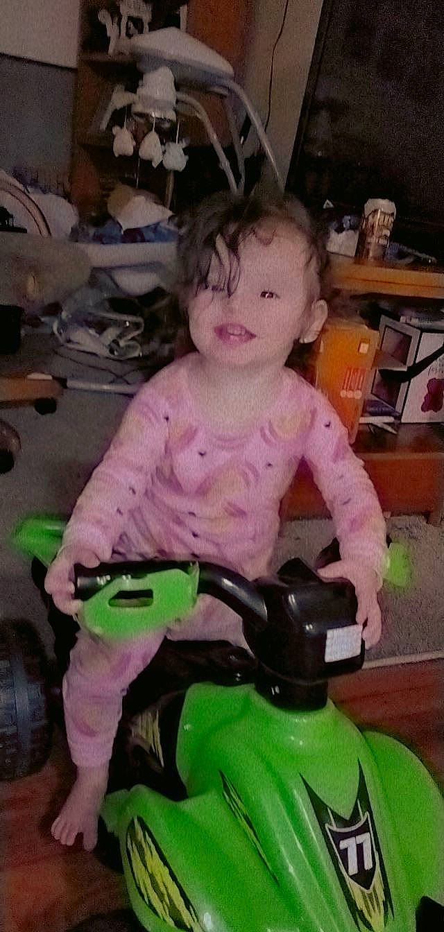 Cordelia joined the competition — help win amazing prizes! baby, baby_carriage, baby_products, baby_toddler_clothing, cheek, child, fun, lap, person, pink, play, recreation, riding_toy, shelf, sitting, smile, t_shirt, toddler, toy, toy_vehicle