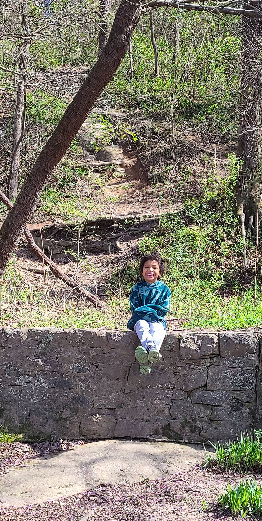 Izaiah joined the competition — help win amazing prizes! biome, electric_blue, forest, grass, joy, jungle, landscape, leaf, leisure, natural_landscape, people_in_nature, person, plant, recreation, smile, soil, toddler, tree, trunk, vegetation