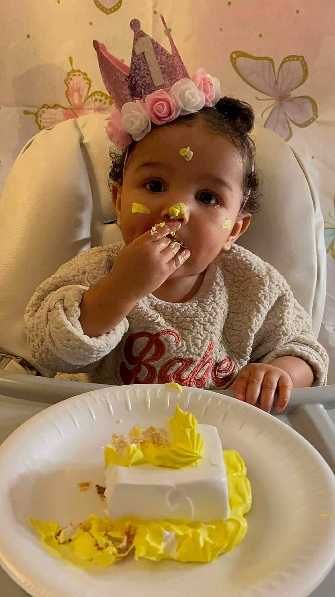 Leilani is registered to the contest to win money with this photo: arthropod, baby, baby_toddler_clothing, butterfly, cuisine, dishware, dress, event, food, happy, ingredient, person, pink, plate, pollinator, serveware, sugar_cake, sweetness, tableware, toddler