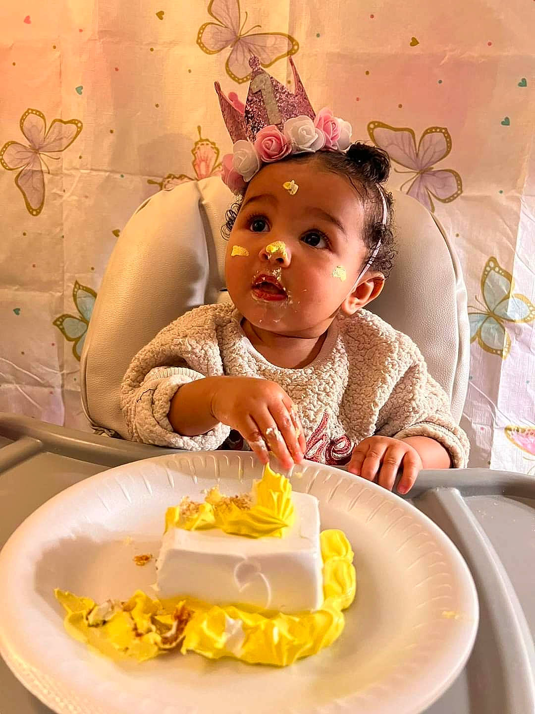 Leilani is registered to the contest to win money with this photo: baby, baked_goods, birthday, birthday_cake, birthday_party, buttercream, cake, cake_decorating, cake_decorating_supply, cuisine, dress, food, food_craving, happy, ingredient, person, plate, sharing, sugar_cake, surprise