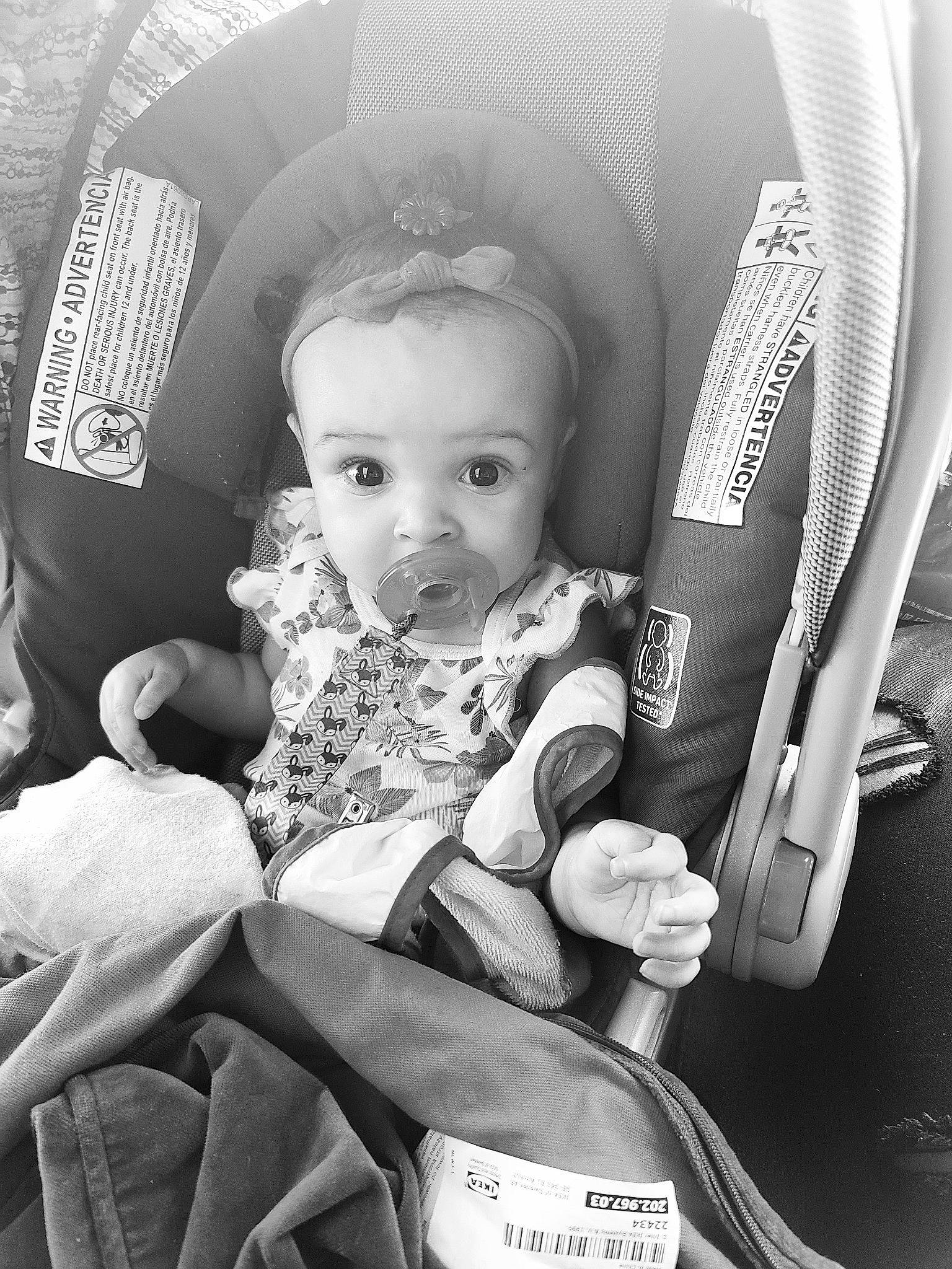 Nia is registered to the contest to win money with this photo: baby, baby_carriage, baby_in_car_seat, baby_products, birth, black_and_white, car_seat, child, comfort, family, monochrome, monochrome_photography, people, person, photograph, photography, product, sitting, snapshot, style