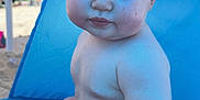 Reginald Iv joined the competition — help win amazing prizes! baby, child, beach, tent, blue, umbrella, sand, summer, sunlight, outdoor, swimwear, sitting, cute, skin, expression, vacation, relaxation, holiday, closeup, portrait