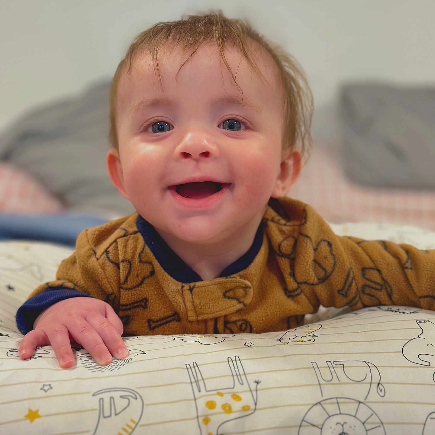 Remington joined the competition — help win amazing prizes! baby, babylaughing, bed, bedroom, bodypart, cushion, face, finger, furniture, hand, happy, head, homedecor, indoors, laughing, person, photography, portrait, quilt, smile