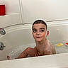 Richard is registered to the contest to win money with this photo: baby, bathing, bathroom, bathtub, cup, electricaldevice, face, head, indoors, person, room, shower, switch, tub