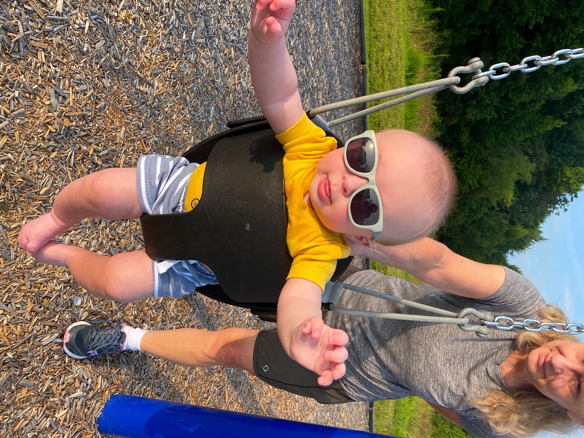 Aidan is registered to the contest to win money with this photo: cool, eyewear, facial_expression, finger, fun, gesture, grass, green, hand, happy, joint, knee, leg, leisure, people_in_nature, person, plant, recreation, smile, sunglasses