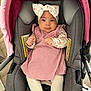 baby, baby_girl, bow, car_seat, child, clothing, cute, fabric, floor, hands, headband, indoor, infant, looking_at_camera, person, pink_dress, portrait, seat, soft, tights