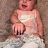 Anastasia joined the competition — help win amazing prizes! baby, infant, smiling, pink_outfit, nike_logo, white_socks, frilly_socks, soft_blanket, texture, cute, happy, portrait, child, indoor, clothing, baby_girl, hand, legs, relaxing, playful