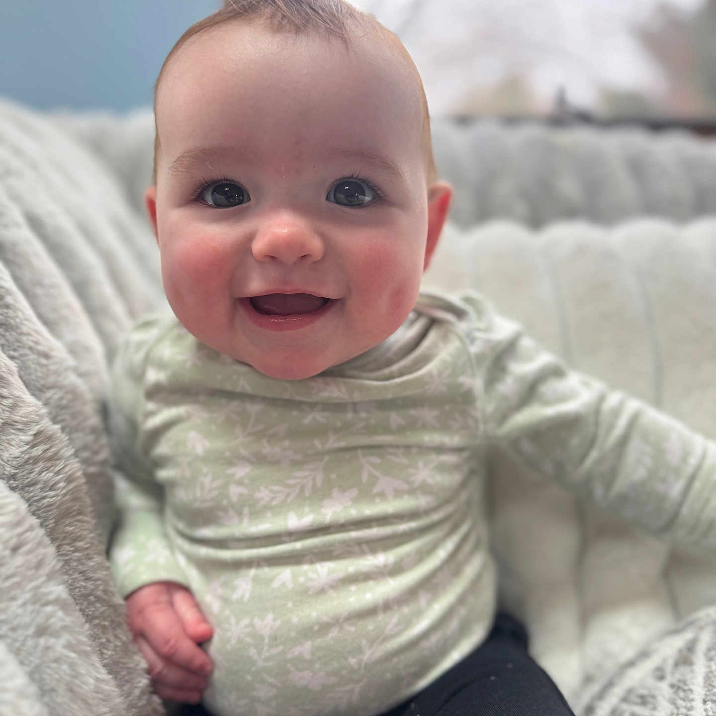 Ivey-Mae joined the competition — help win amazing prizes! baby, babylaughing, bodypart, clothing, couch, face, finger, furniture, hand, happy, head, laughing, longsleeve, pants, person, photography, portrait, sitting, sleeve, smile