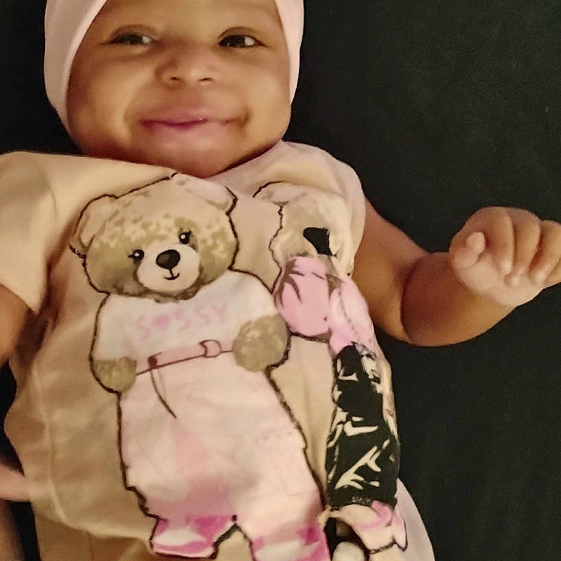 Envia joined the competition — help win amazing prizes! baby, baseballcap, bodypart, bonnet, cap, clothing, dress, face, finger, hand, happy, hat, head, hood, newborn, person, photography, portrait, smile, t_shirt