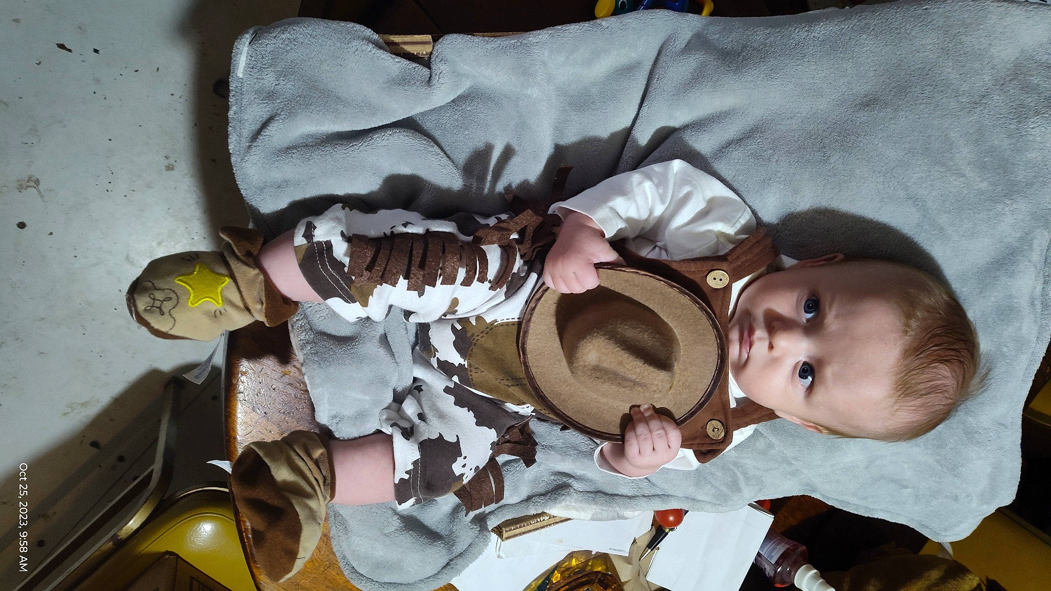 Ayden is registered to the contest to win money with this photo: baby, baby_products, baby_toddler_clothing, comfort, comfort_food, food, fun, hat, headgear, mouth, pattern, person, personal_protective_equipment, room, tableware, toddler, white, yellow