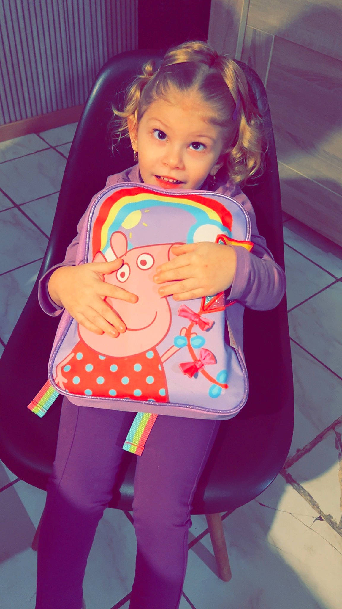 Inaya participe au concours pour gagner de l'argent avec cette photo : baby, bag, child, event, face, fun, happy, head, lip, magenta, mouth, organ, pattern, person, pink, purple, sleeve, standing, surprise, t_shirt