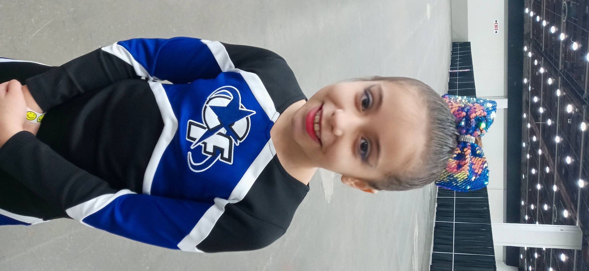 Mya is registered to the contest to win money with this photo: active_shirt, baby, child, electric_blue, face, flash_photography, fun, happy, jersey, joy, leisure, logo, person, portrait_photography, sleeve, smile, sports_jersey, sports_uniform, sportswear, t_shirt