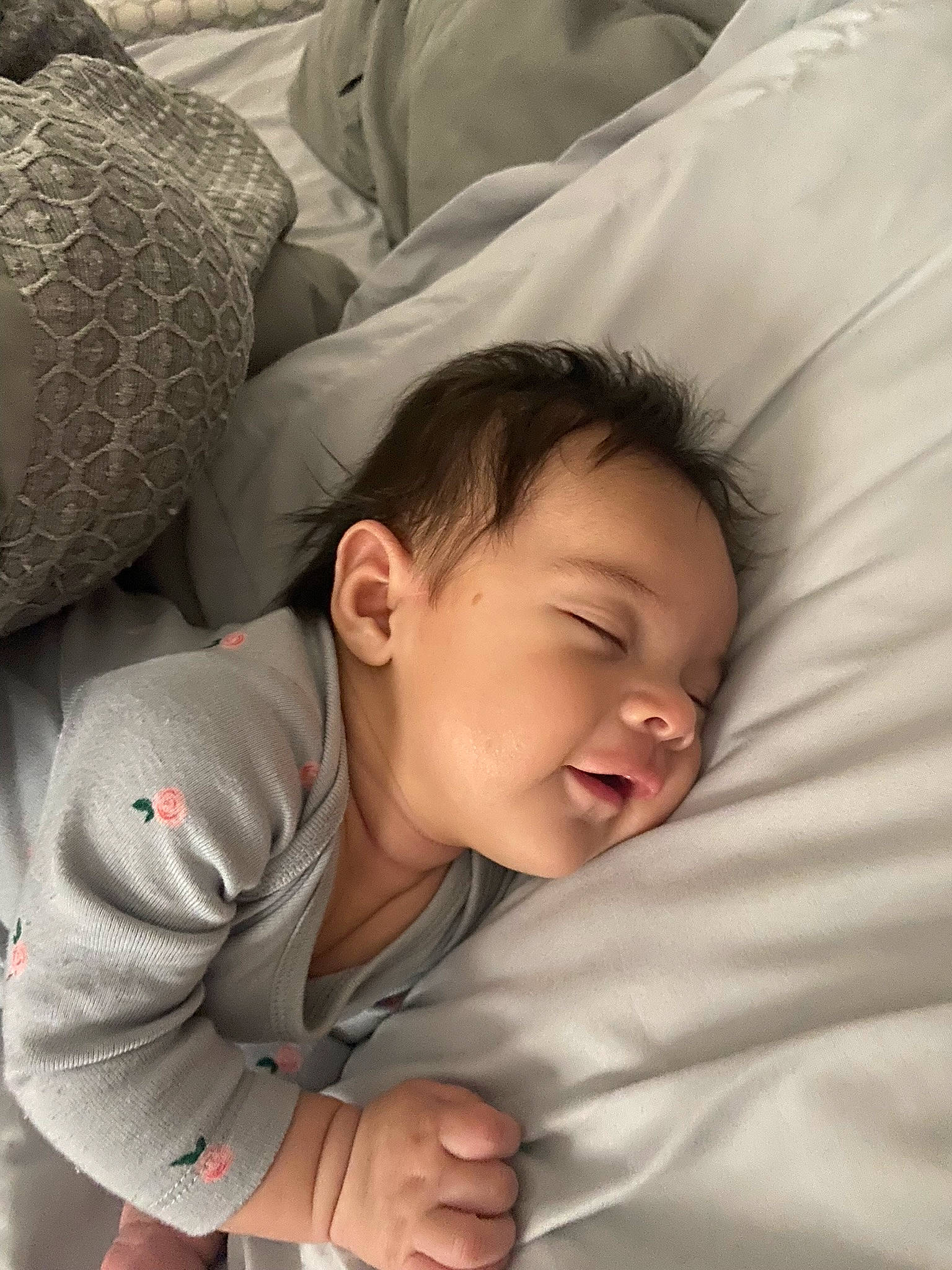 Elise is registered to the contest to win money with this photo: baby, baby_sleeping, bedding, bedtime, cheek, child, comfort, eye, face, flesh, gesture, happy, linens, nap, nose, person, portrait_photography, room, sleep, thumb