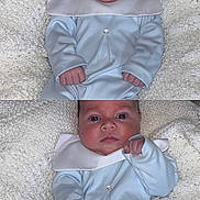 Myles is registered to the contest to win money with this photo: baby, infant, blue_outfit, white_collar, knitted_blanket, smiling, calm, cute, child, portrait, indoors, cozy, soft_texture, hands, face, person, newborn, expression, lying_down, closeup