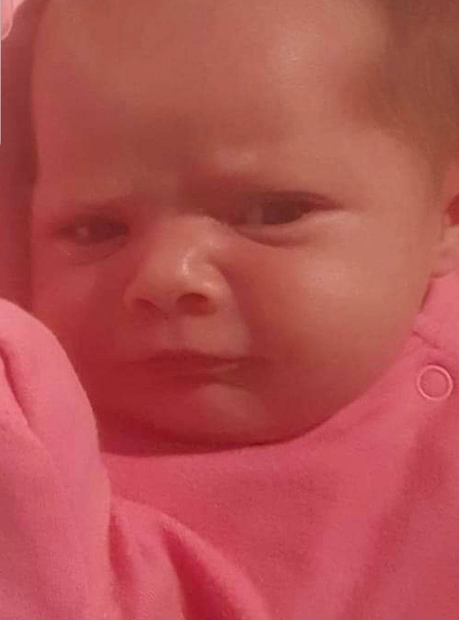 Harper is registered to the contest to win money with this photo: baby, bedtime, cheek, child, chin, close_up, comfort, ear, eyebrow, eyelash, finger, gesture, lip, mouth, nose, peach, person, pink, skin, thumb