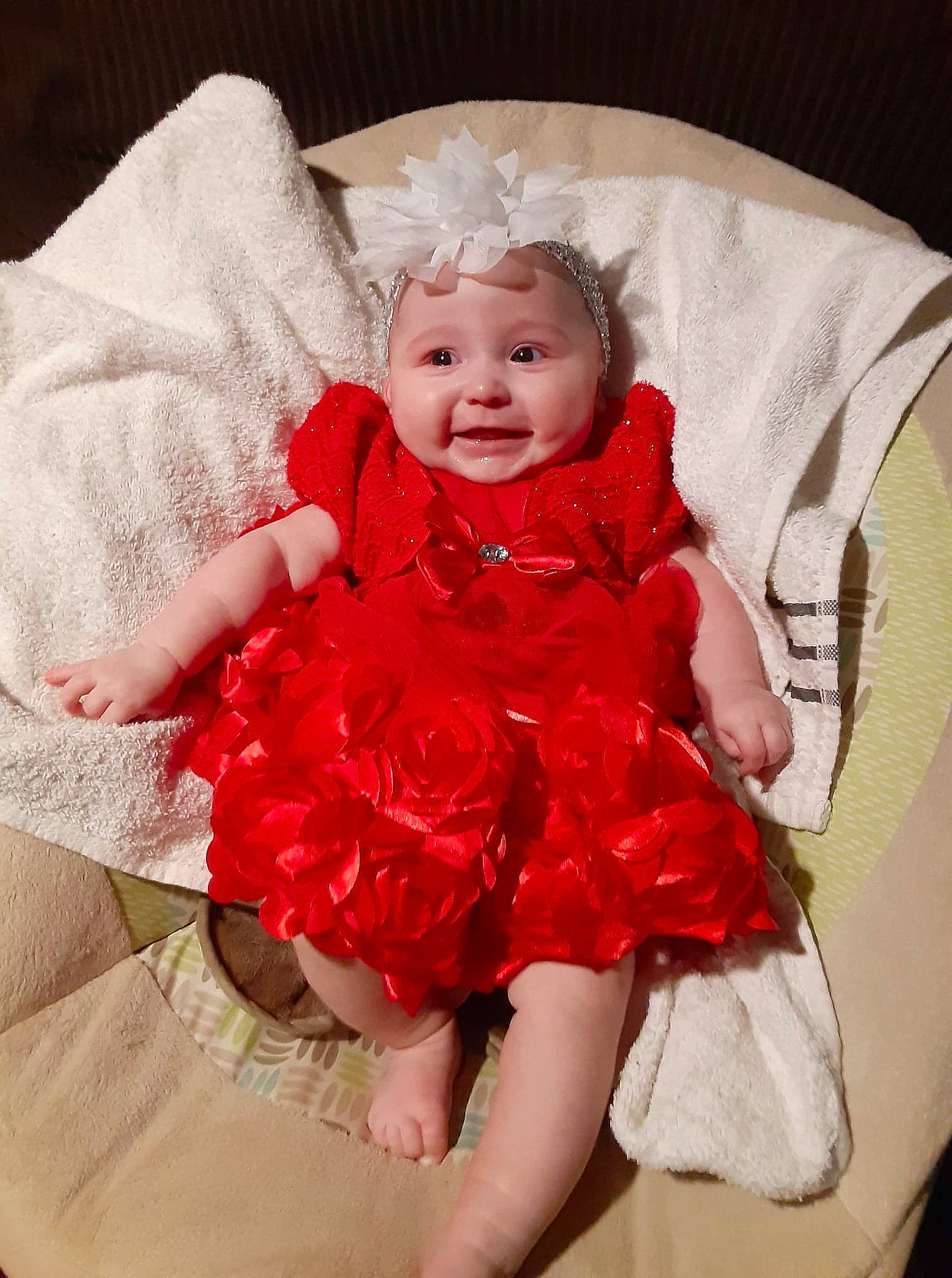 Lailah joined the competition — help win amazing prizes! baby, child, headwear, person, photography, red, sitting, smile, textile, toddler