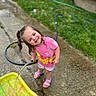 Denver is registered to the contest to win money with this photo: child, girl, smiling, water_hose, water_play, outdoor, summer, wet_hair, pink_shirt, shorts, sandals, grass, concrete, garden_hose, play, happy, fun, toy, water, backyard