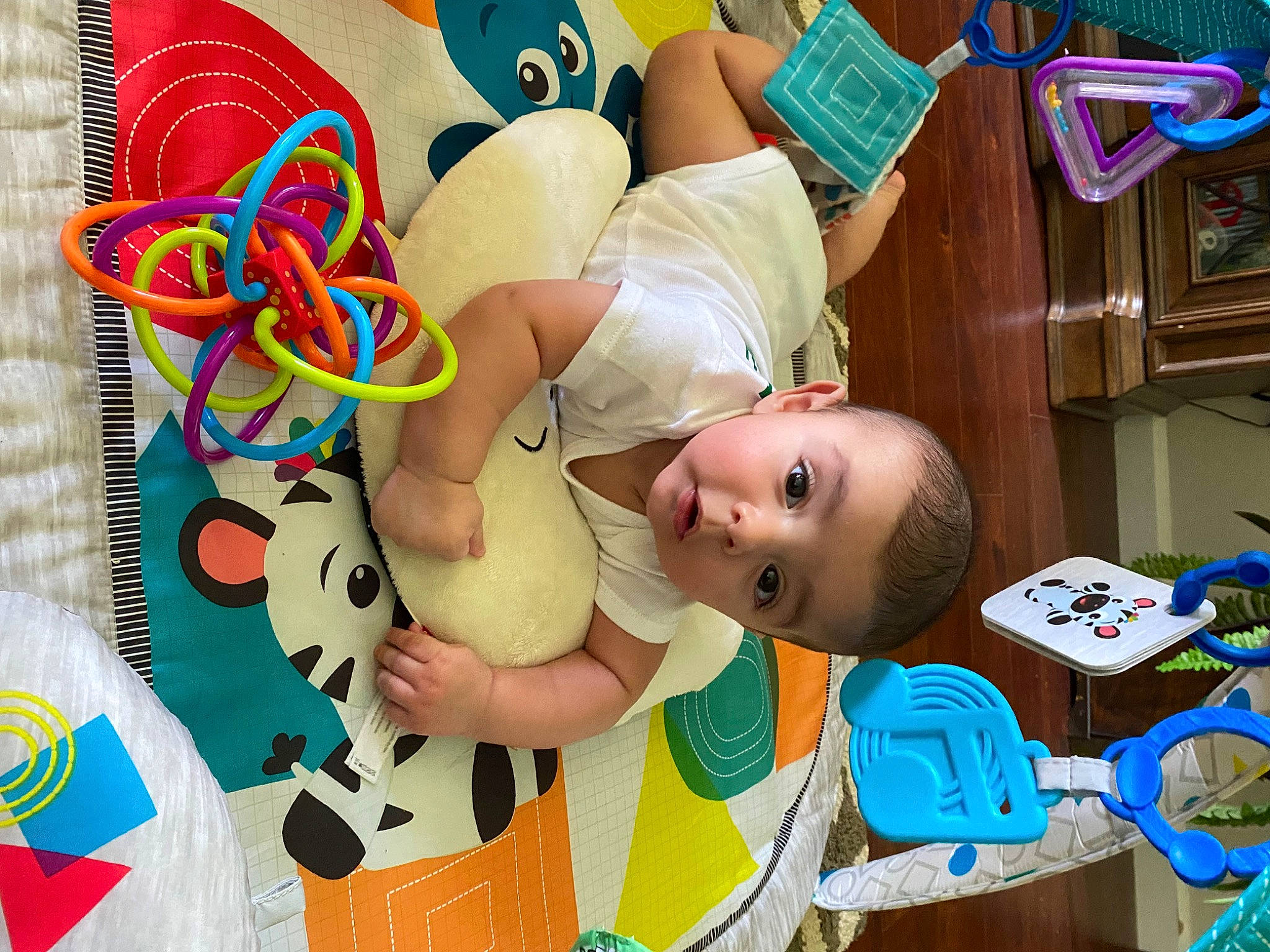 Angelo is registered to the contest to win money with this photo: art, baby, baby_products, baby_toys, child, fun, happy, hat, leisure, mammal, pattern, person, play, product, room, smile, toddler, toy, visual_arts, yellow