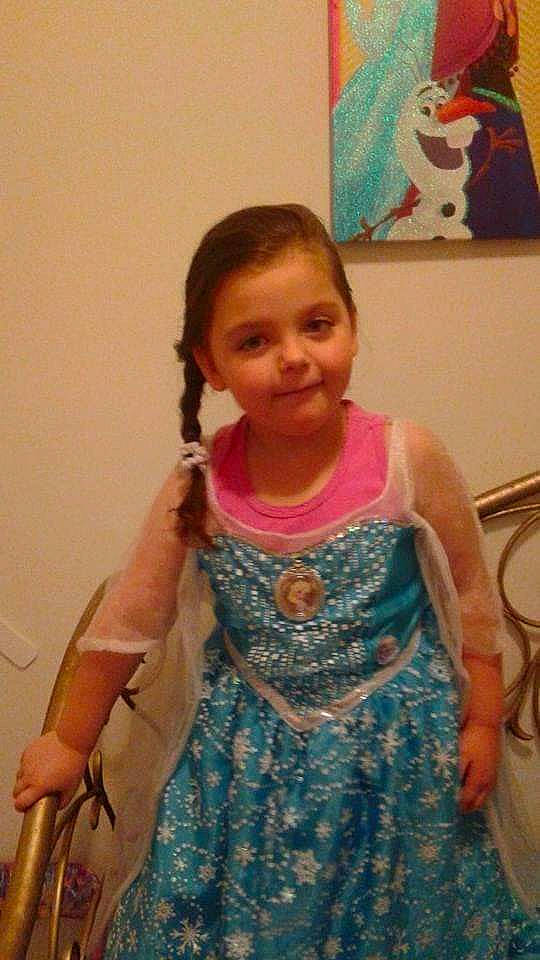 Kelly-ann participe au concours pour gagner de l'argent avec cette photo : arm, baby_toddler_clothing, cheek, child, day_dress, embellishment, fashion_design, gesture, hairstyle, happy, head, joy, organ, pattern, person, pink, shoulder, sleeve, smile, textile