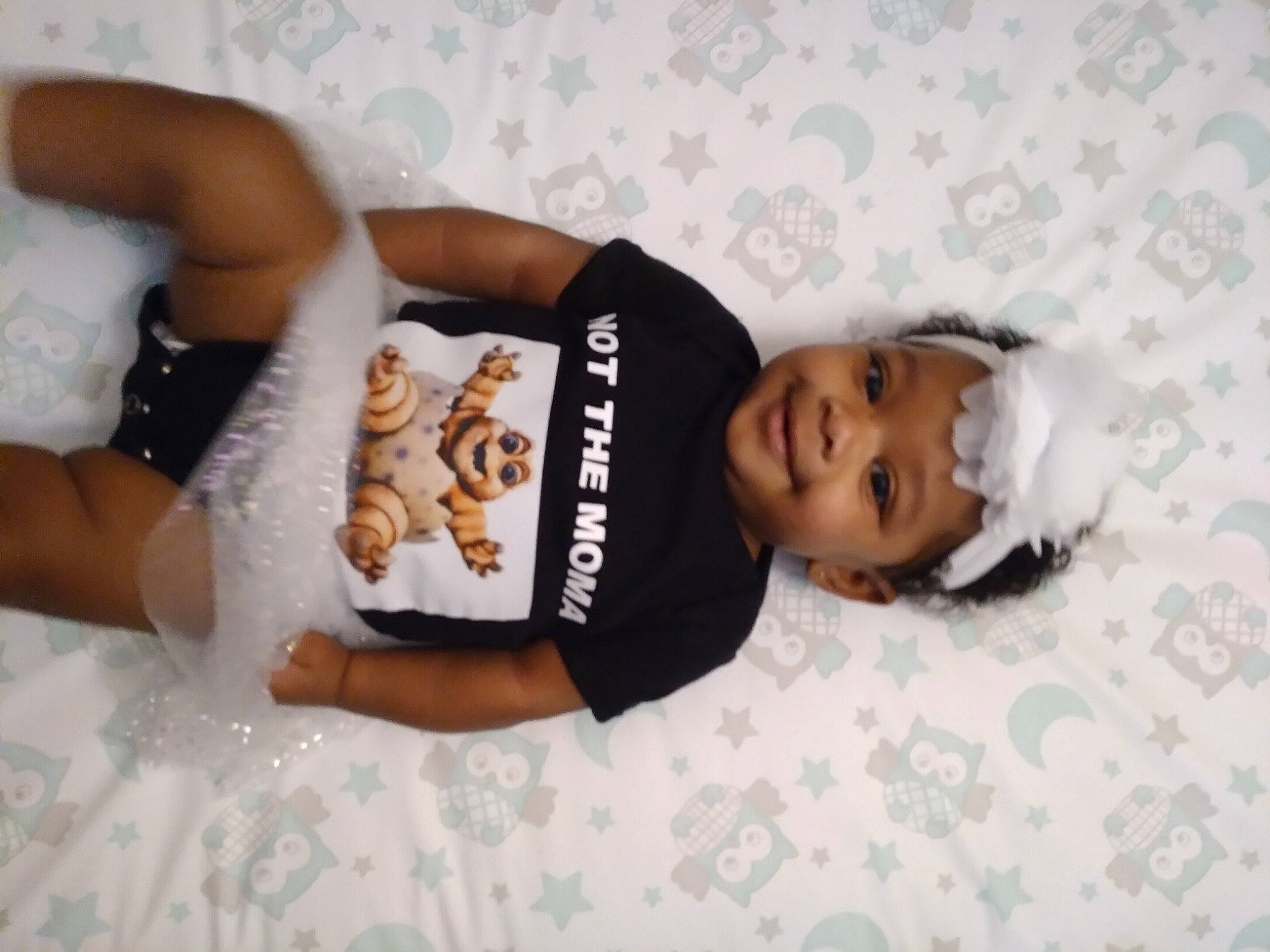 Ja'Layah is registered to the contest to win money with this photo: arm, comfort, elbow, finger, flash_photography, gesture, happy, headwear, human_leg, joint, joy, knee, leg, linens, neck, person, skin, sleeve, t_shirt, thigh