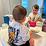 Mira participe au concours pour gagner de l'argent avec cette photo : toddler, child, sink, mirror, bathroom, reflection, soap, towel, white_shirt, smile, happy, short_hair, window, counter, tap, soap_dish, interior, plumbing_fixtures, person, casual_clothing