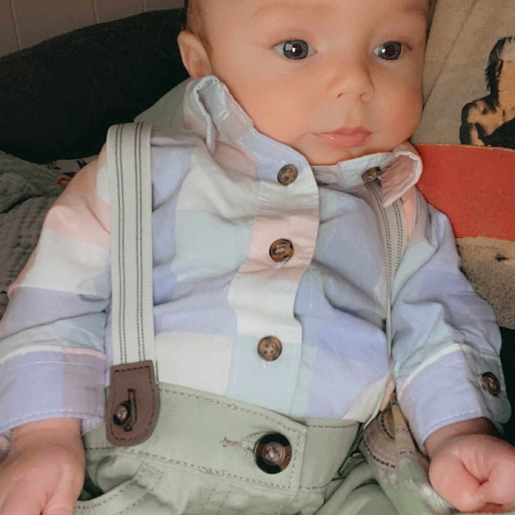 Baylor joined the competition — help win amazing prizes! accessories, adult, baby, clothing, coat, couch, cushion, face, female, furniture, head, homedecor, jacket, jeans, pants, person, photography, portrait, shirt, woman