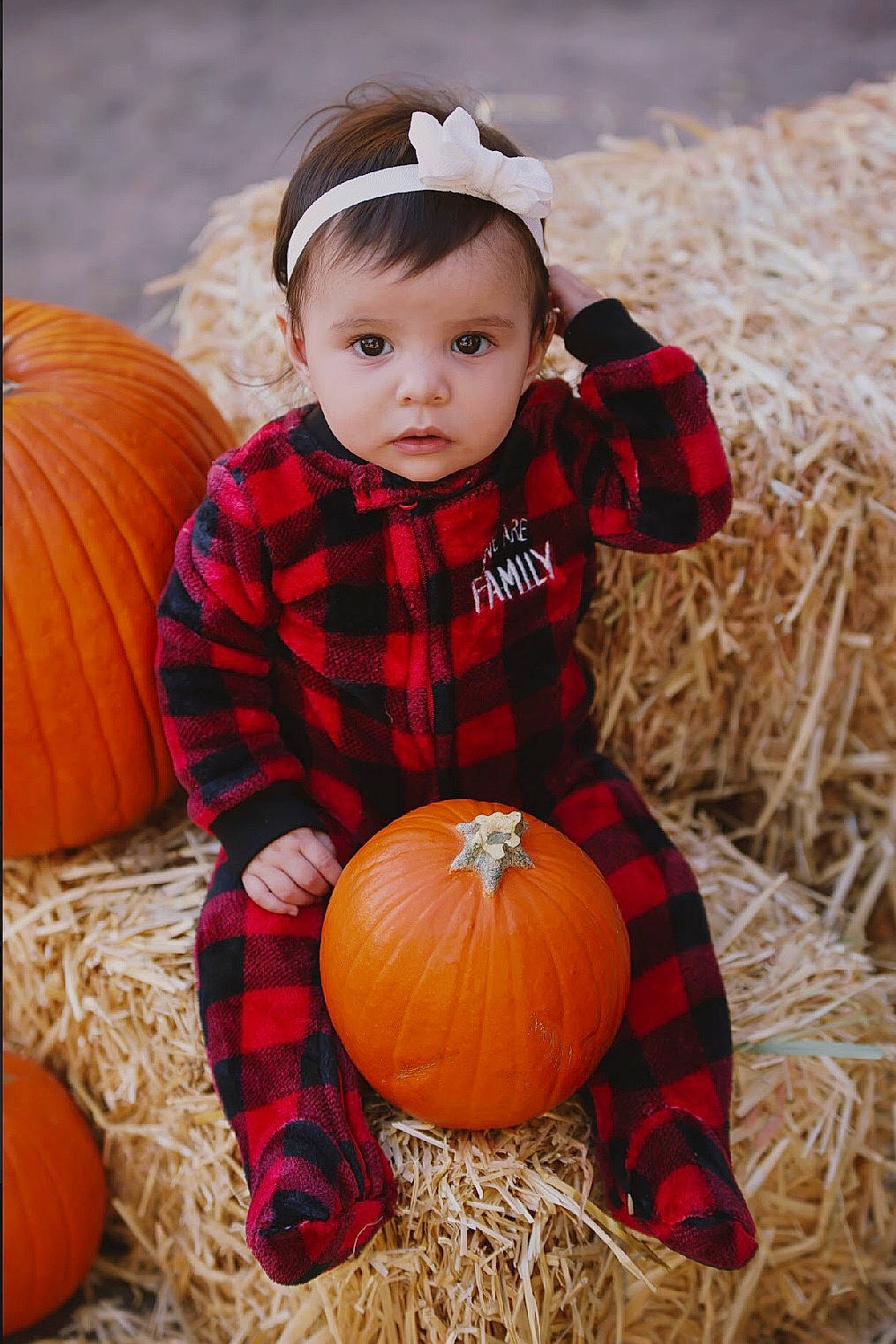 Aria is registered to the contest to win money with this photo: baby_toddler_clothing, calabaza, cucurbita, dress, eye, face, gourd, grass, happy, head, natural_foods, orange, people_in_nature, person, plant, pumpkin, squash, toddler, vegetable, winter_squash