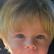 Greyson is registered to the contest to win money with this photo: child, boy, face, portrait, blond_hair, blue_eyes, smile, close_up, young_child, casual_clothing, sunlight, natural_light, head_and_shoulders, innocence, happy, person, outdoor, background_blur, cute, skin