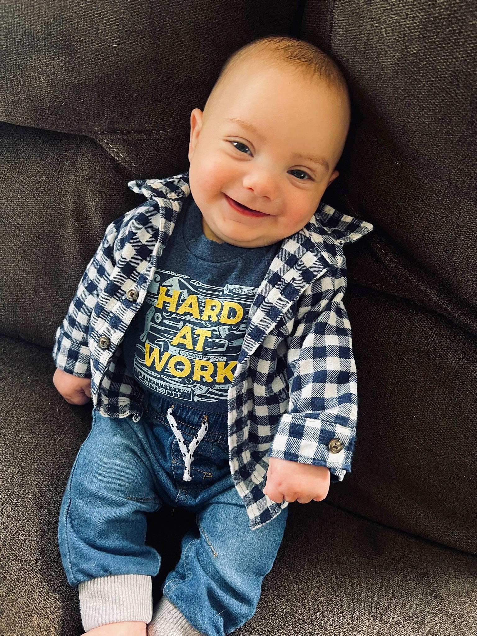 Maximus is registered to the contest to win money with this photo: baby, baby_toddler_clothing, cheek, clothing, collar, comfort, electric_blue, eye, flash_photography, happy, head, iris, joy, outerwear, pattern, person, skin, sleeve, smile, t_shirt