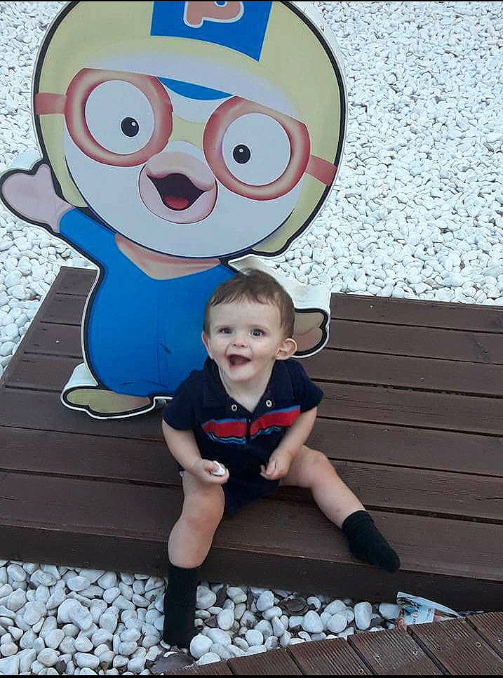 Aiden is registered to the contest to win money with this photo: blue, child, competition_event, cool, day, fun, person, play, product, recreation, smile, toddler, vacation