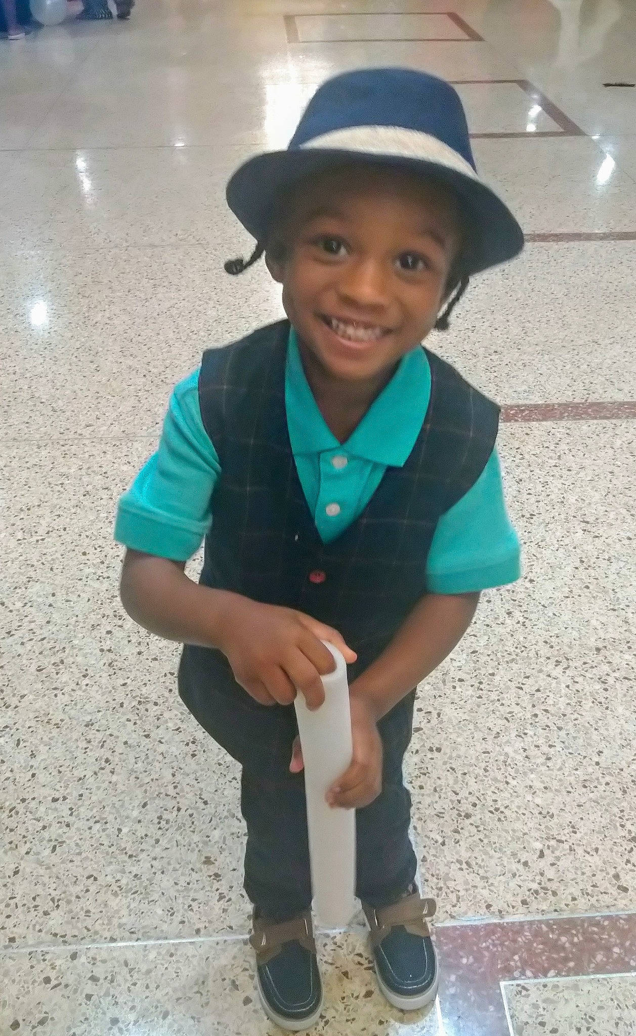 Skylar is registered to the contest to win money with this photo: child, fashion_accessory, fedora, hat, headgear, headwear, joy, outerwear, person, smile, sun_hat, toddler