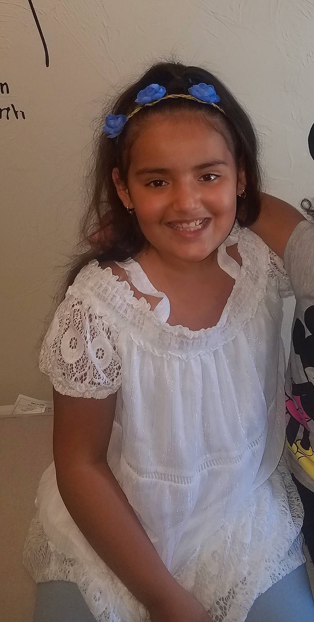 Jaslene is registered to the contest to win money with this photo: bridal_accessory, child, child_model, clothing, fashion_accessory, hair_accessory, headgear, headpiece, joy, lace, long_hair, person, smile