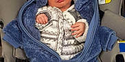 Arthur joined the competition — help win amazing prizes! baby, infant, car_seat, blue_onesie, sleeping, cozy, knitted_sweater, child, safety, seatbelt, infant_clothing, newborn, cute, closed_eyes, hooded_jacket, soft_texture, indoor, relaxed, small_hands, wearing_clothes