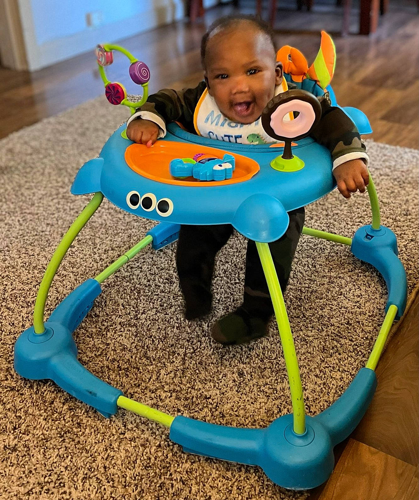 Kamryn is registered to the contest to win money with this photo: baby, baby_playing_with_toys, baby_products, baby_toddler_clothing, baby_toys, blue, chair, child, electric_blue, fashion_accessory, font, fun, happy, person, plastic, play, product, smile, toddler, toy