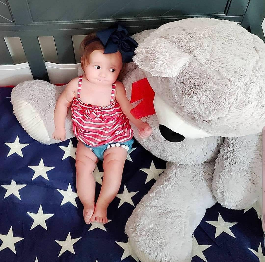 Story joined the competition — help win amazing prizes! baby, child, cool, design, doll, eye, fur, head, headgear, joy, leg, pattern, person, pink, plush, sitting, skin, stuffed_toy, textile, toddler