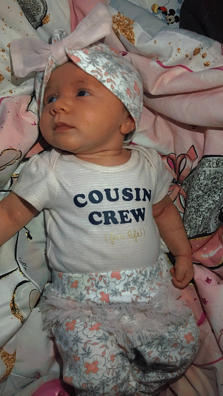 Ja'Zara is registered to the contest to win money with this photo: baby, baby_products, baby_toddler_clothing, cap, cheek, child, comfort, eye, face, fun, happy, headwear, mouth, pattern, person, pink, product, skin, sleeve, t_shirt