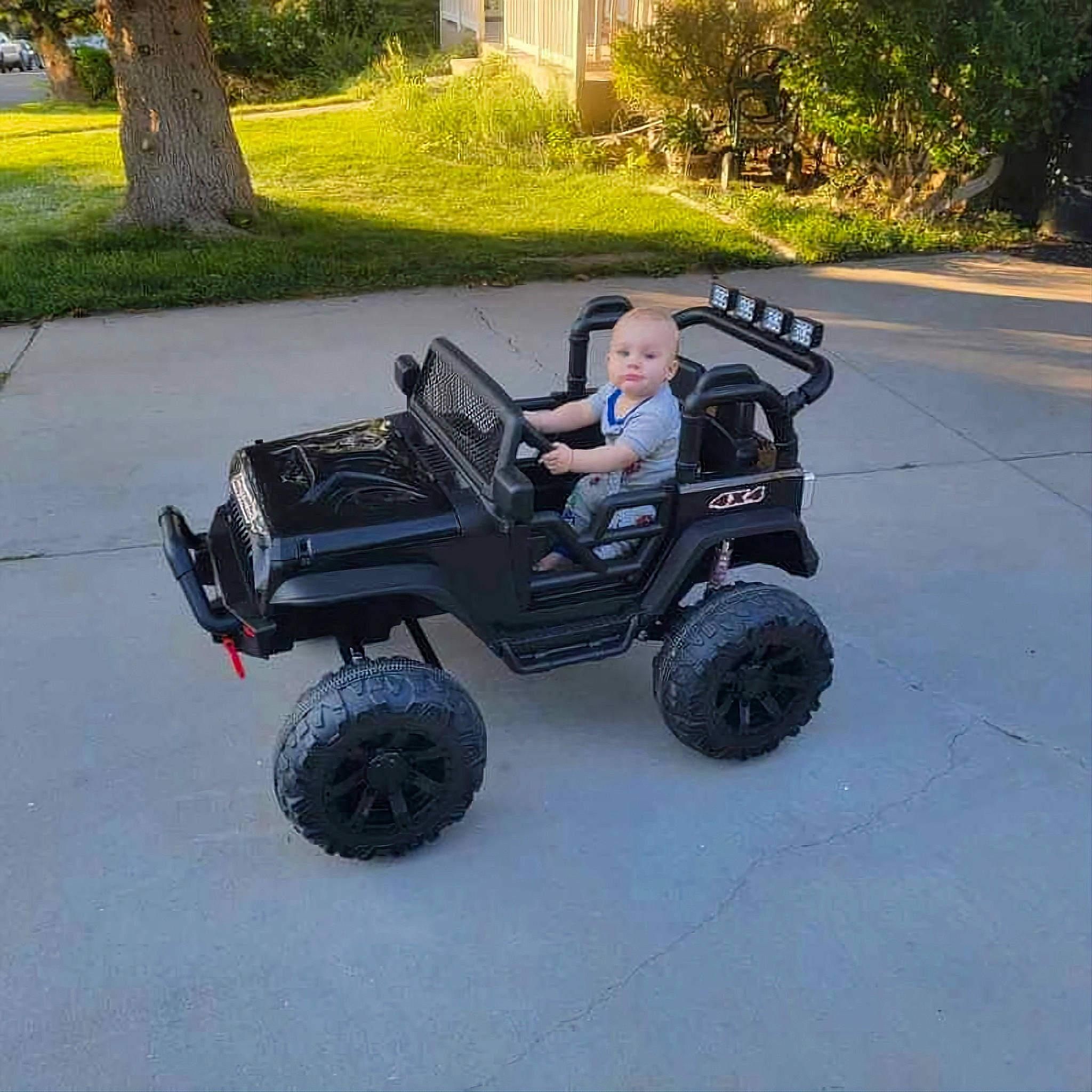 Landon joined the competition — help win amazing prizes! asphalt, auto_part, automotive_design, automotive_exterior, automotive_tire, automotive_wheel_system, bumper, car, fender, grass, green, motor_vehicle, person, plant, rim, synthetic_rubber, tire, tread, tree, vehicle