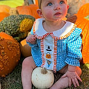 Maddie Mae joined the competition — help win amazing prizes! baby, child, portrait, pumpkin_patch, pumpkins, gourds, outdoor, autumn, fall, blue_bow, gingham_outfit, costume, sitting, grass, white_pumpkin, orange_pumpkins, wide_eyed, infant, harvest, seasonal
