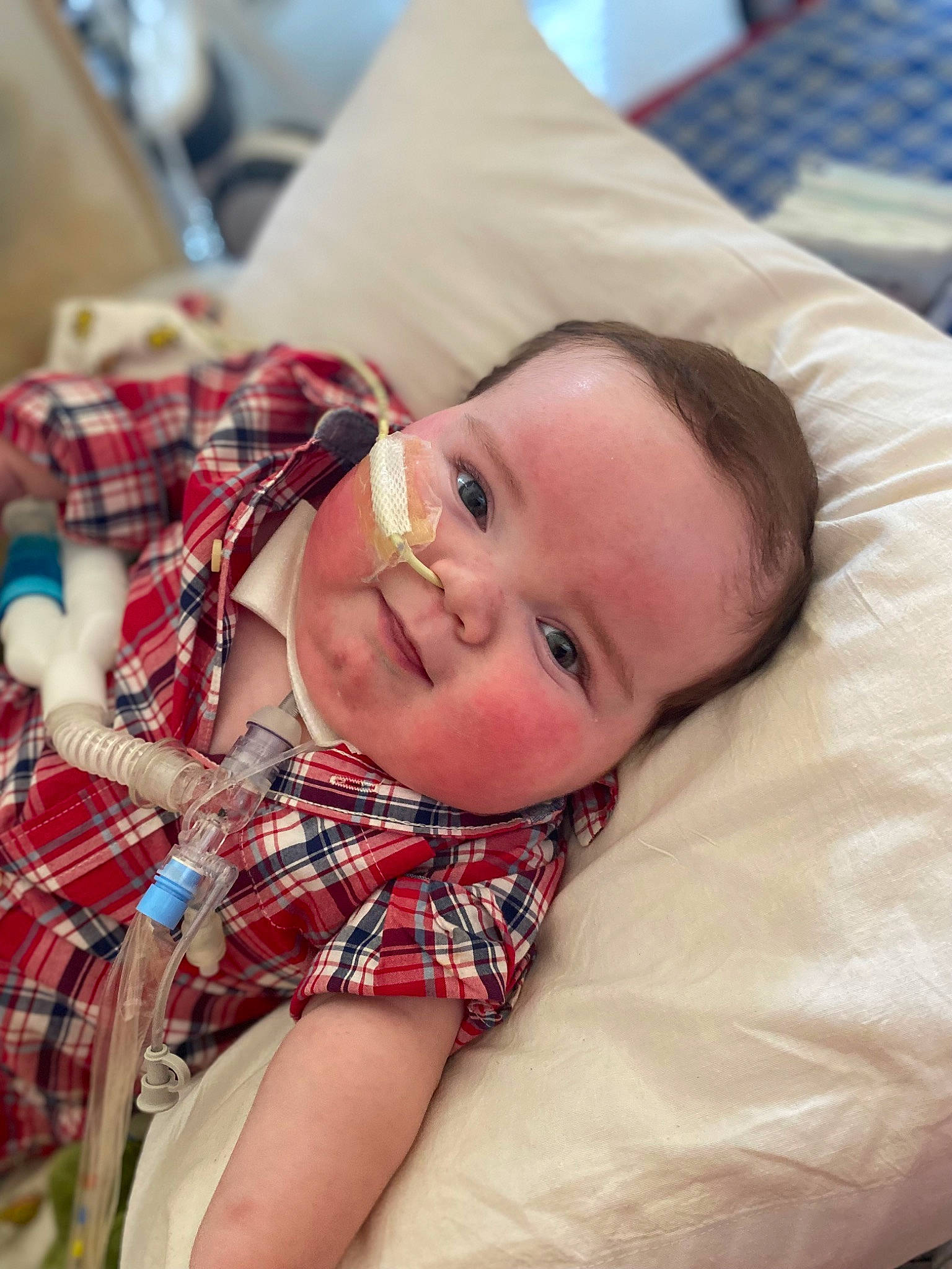 Landry joined the competition — help win amazing prizes! baby, baby_toddler_clothing, child, comfort, eye, face, finger, fun, happy, hat, head, lip, mouth, pattern, person, plaid, skin, smile, tartan, textile