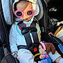 accessory, baby, car_interior, car_seat, child, cute, doll, footwear, hood, infant, plush_toy, portrait, relaxing, seatbelt, sleeping, straps, sunglasses, sunlight, toy, white_clothing