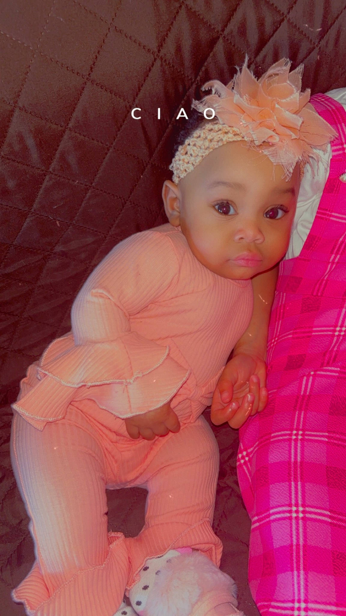 Mireya is registered to the contest to win money with this photo: baby, baby_toddler_clothing, chest, embellishment, event, fun, happy, headband, headpiece, human_body, iris, jewellery, lip, pattern, peach, person, pink, sitting, skin, sleeve