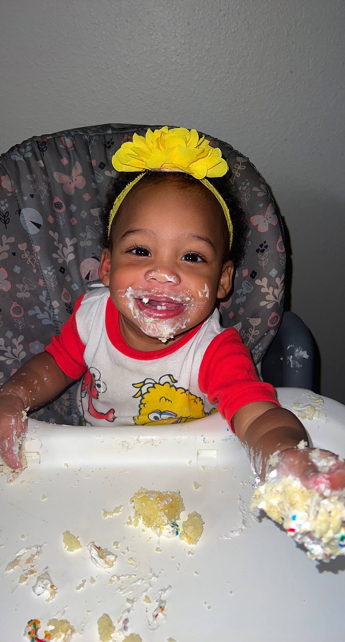 Ariella joined the competition — help win amazing prizes! baby, baby_toddler_clothing, chair, child, comfort_food, dishware, event, fashion_accessory, food, fun, happy, headband, joy, person, plate, sleeve, smile, sweetness, tableware, toddler