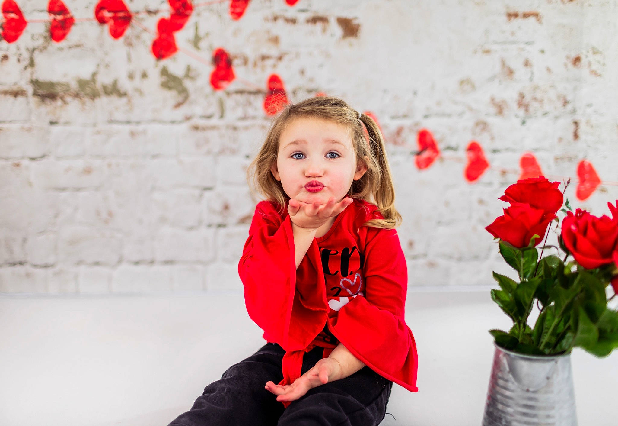 Brooklyn joined the competition — help win amazing prizes! beauty, brown_hair, face, flash_photography, flower, flowerpot, grass, happy, people, people_in_nature, person, petal, photograph, pink, plant, red, sitting, sleeve, toddler, vase