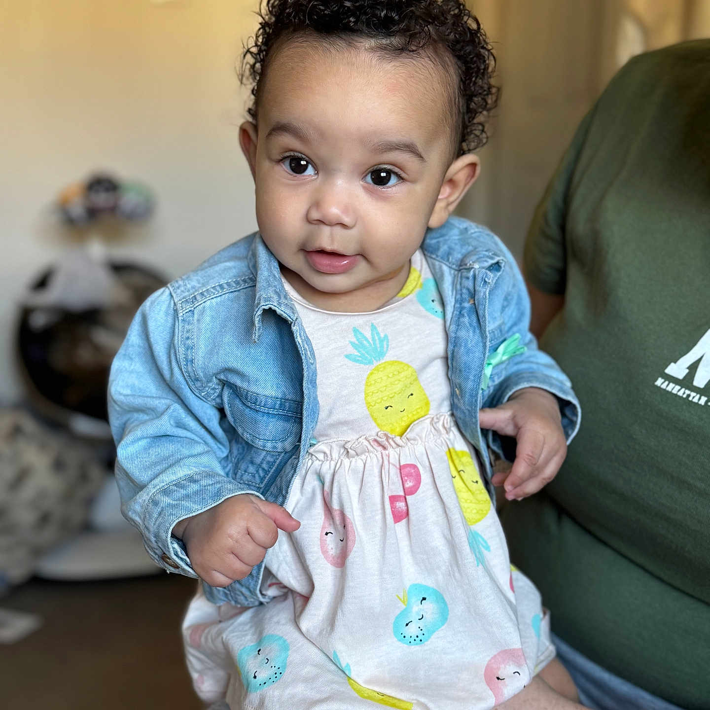 Reign is registered to the contest to win money with this photo: baby, bodypart, clothing, couch, face, finger, furniture, hand, happy, head, jeans, longsleeve, pants, person, photography, portrait, shorts, sitting, sleeve, smile