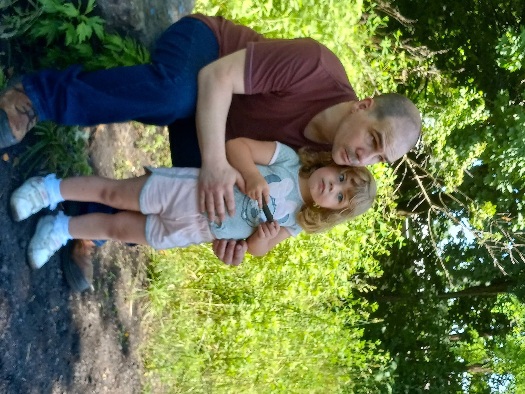 Remington Larae is registered to the contest to win money with this photo: arm, child, clothing, event, fun, gesture, grass, happy, landscape, leisure, people, people_in_nature, person, plant, recreation, shorts, smile, soil, t_shirt, thigh